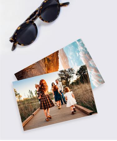 4x6 prints on a table with sunglasses